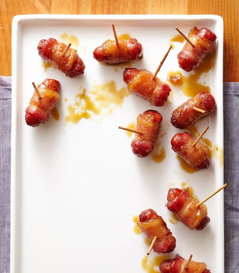 35 Halloween Potluck Ideas for Dishes to Serve at Your Monster Mash Sugared Bacon, Halloween Potluck Recipes, Wrapped Smokies, Bacon Wrapped Sausages, Toothpick Appetizers, Bacon Wrapped Smokies, Warm Appetizers, Turkey Bacon Wrap, Little Smokies