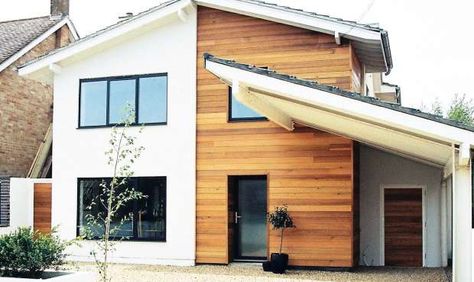 Adding render and cedar cladding to the exterior or this formerly plain 1960s house has transformed the property into a contemporary home. Shallow-pitched roofs complete the look. Extension Exterior, House Frontage, Garage Extension, Rendered Houses, 1970s House, 1960s House, Retro Cottage, 70s House, Exterior House Remodel