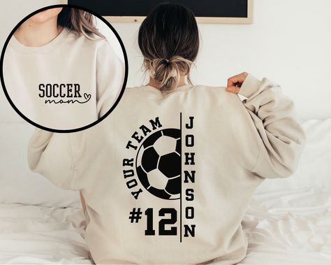 Customize this soccer shirt to meet your needs! Choose from short sleeve, long sleeve, hoodies, and crewneck sweatshirts and add your mascot/team, name, and number! Other color options and styles are available. If you don't see what you're looking for send us a message! The shirts are a UNISEX retail fit - they are more of a relaxed fit and tend to run a little large on women and those with a smaller frame . Make sure to see the size charts (last images) to confirm the best fit for you. We recom Soccer Shirts Designs, Soccer Dad Shirt, Soccer Sweatshirt, Soccer Hoodies, Sports Mom Shirts, Soccer Mom Shirt, School Spirit Shirts, Soccer Shirt, Retro Game