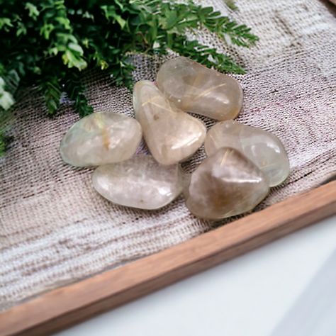 Perfect for meditation or carrying in your pocket for daily inspiration, this crystal is believed to promote spiritual growth, enhance intuition, and offer protection from negative energies. Its tumbled shape makes it easy to hold and display, while its durable material ensures long-lasting use. Add this beautiful Rutilated Quartz Tumbled Stone to your collection today and experience its powerful energy for yourself. Small stones up to 2cm... https://kjahli.au/product/rutilated-quartz-tumbl... Zodiac Essential Oils, Candle Wax Warmer, Christmas Cleaning, Couple Gifts For Her, Perfume Jewelry, Leather Jewellery, Personalized Jewelry Box, Powerful Energy, Stone Chips