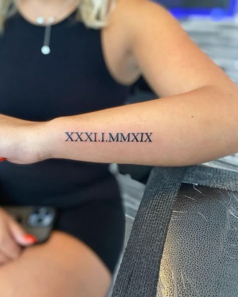 Roman Numeral Birthday Tattoo, Roman Numeral Tattoo Arm, Roman Numeral Wrist Tattoo, Numeral Tattoo Ideas, Roman Numeral Tattoo Ideas, Roman Numeral Date Tattoo, Roman Numbers Tattoo, Birthdate Tattoo, Side Wrist Tattoos