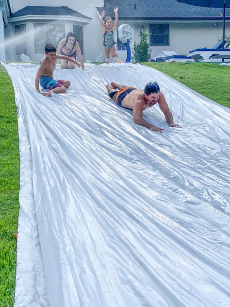 At Home Slip And Slide, Huge Slip And Slide, Home Made Slip And Slide, Slip N Slide Aesthetic, Adult Slip And Slide Party, Tarp Slip N Slide, Diy Slip N Slide, Backyard Slip And Slide, Slip N Slide Party