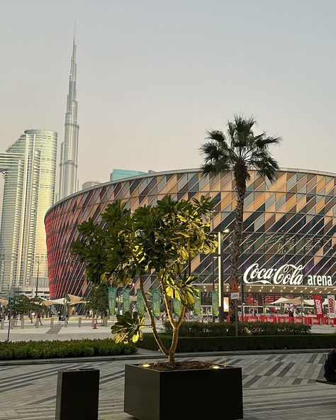 30 days of my favourite places in Dubai 🇦🇪 Day 10: City Walk Watching Hans Zimmer at the Coca Cola arena meant we got to visit city walk for the first time. We parked (for over 6 hours for free btw) at city walk, enjoy a wood fired pizza and then walked less than 2 mins to the arena. And can we talk about the view walking to the stadium 🤩 #hanszimmer #cocacolaarena #dubai #burjkhalifa City Walk Dubai, Dubai Burjkhalifa, Places In Dubai, Dubai Aesthetic, Can We Talk, Wood Fired Pizza, The Arena, Burj Khalifa, The View