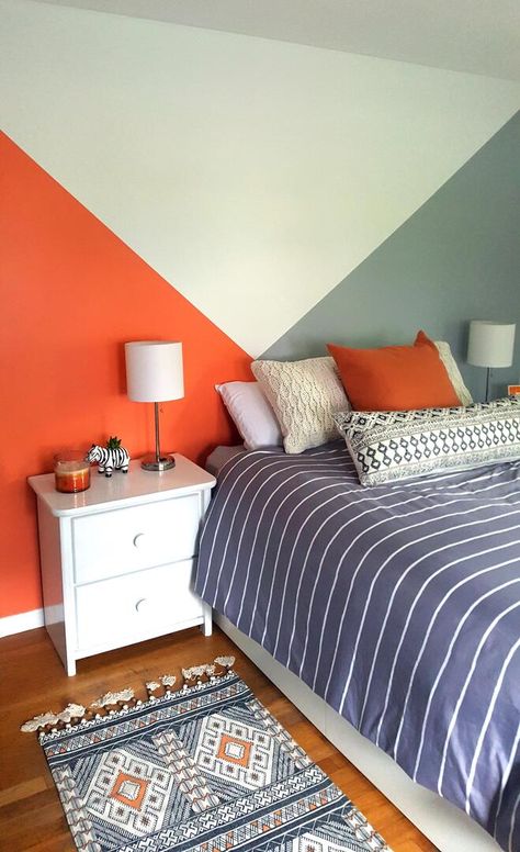 Bold patterned rug with neutral furniture. Blue And Orange Accent Wall, Blue And Orange Boys Bedroom, Blue And Orange Boys Room, Orange Boys Bedroom, Orange And Blue Bedroom, Complementary Colour Scheme, Boys Bedroom Orange, Colorful Boys Room, Orange Bedroom Walls