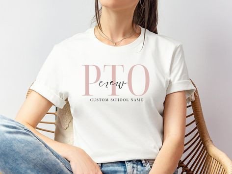 Show your school spirit with our stylish PTA and PTO shirts! Perfect for parents who are as dedicated to style as they are to school involvement. 🏫✨ LINK TO SHOP IN BIO 🔗‼️ 50% OFF WHOLE STORE 🏷️💯Customize with your school’s name and support your local programs in style! #PTAShirt #PTOShirt #SchoolSpirit #ParentTeacherAssociation #ParentTeacherOrganization #CustomSchoolGear #SupportSchools #SchoolPride #ParentInvolvement #EducationalSupport #CommunityStrong #LocalSchools #ParentLife #teachers... Pto Shirts, Pto Fundraising Ideas, Pto Events, Pta Shirts, School Spirit Days, Spirit Days, Pta School, School Pto, Bold Letters