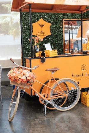 Veuve Clicquot Bridal Classic at Veranda in Los Angeles, California | 31 more photos on PartySlate Veuve Clicquot Pool Party, Veuve Clicquot Party Decor, Veuve Clicquot Polo Classic Decor, Wall Of Greenery, Verve Cliquot Event, Pink And Orange Roses, Shades Of Pink And Orange, Veuve Polo Classic, Veuve Cliquot