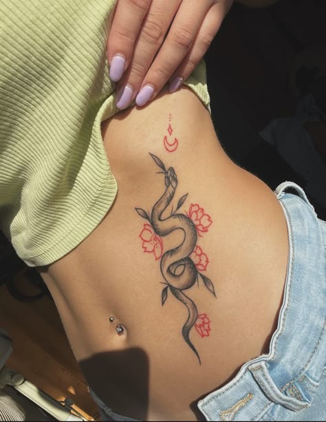 Snake tattoo and flowers Tattoo Lower Leg Woman, Snake Tattoos Rib Cage, Snake And Tulip Tattoo, Ankle Snake Tattoo, Snake Tattoo Between Breast, Snake Tattoo With Flowers, Snake With Flowers Tattoo, Snake Flower Tattoo, Snake And Flowers Tattoo