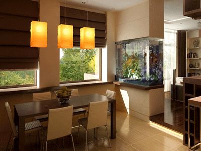 Feeling adventurous? Fish tanks provide a great source of interest and calm in any room. Add this idea to your dining room to create a calming discussion point that relaxes guests. Feng Shui Fish, Fish Tank Wall, Room Feng Shui, Wall Aquarium, Feng Shui Living Room, Feng Shui Wealth, Feng Shui Decor, Home Aquarium, Stylish Home Decor