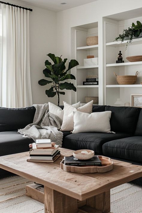 Gray Couches Decor, Couches Living Room Colors, Lounge Decor Black Sofa, Scandinavian Living Room Dark Couch, Grey Walls Black Furniture Living Room, Black Couch Living Room Decor Apartment, Living Room Decor Dark Sofa, Black Couch With Pillows, Organic Modern Dark Couch