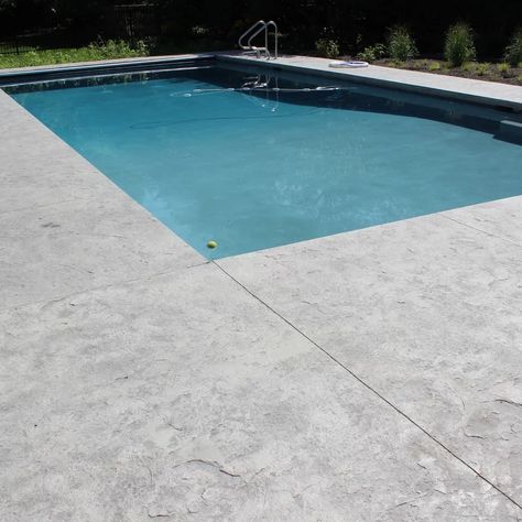 Colored Concrete Pool Deck, Sand Finish Concrete Pool Deck, Concrete Pool Coping Ideas, Poured Concrete Pool Deck, Textured Concrete Pool Deck, Kool Decking Around Pool, Pool Concrete Colors, Pool Decking Options, Salt Finish Concrete Pool Deck