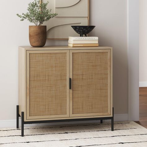 PRICES MAY VARY. Andrew is a bohemian accent cabinet with a total of five interior cubbies and adjustable shelves. The accent cabinet or kitchen sideboard features natural rattan cabinet doors and sleek metal legs, giving it a natural yet elegant appeal. Due to characteristics of natural rattan, each Andrew cabinet embodies unique color and texture. Pair with our matching side table, dresser, or console table for a beautifully cohesive and functional furniture. Easy assembly and lifetime manufac Wall Bar Shelf, Hallway Sideboard, Entryway Storage Cabinet, Nathan James, Accent Storage Cabinet, Modern Buffet, Store Books, Buffet Sideboard, Wood Storage Cabinets