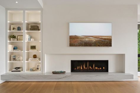 We have a thing for gorgeous interior fireplace wall. Linear fireplace and custom cabinetry shelving bathing in a soft muted palette: form… | Instagram Linear Fireplace Wall, Function Aesthetic, Interior Fireplace, Design Fireplace, Linear Fireplace, Muted Palette, Gorgeous Interiors, Fireplace Wall, Fireplace Design