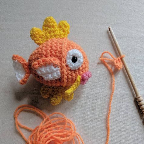 Sorry for the delay! Just got back from camping and finally got the chance to type the pattern up. Have fun crocheting your own Magikarp!… Gyrados Pokemon Crochet, Growlithe Crochet Pattern, Magikarp Crochet Pattern, Jiggly Puff Crochet, Fuecoco Crochet Pattern, Mini Pokemon Crochet Patterns Free, Gyarados Crochet, Crochet Magikarp, Geeky Crochet Patterns