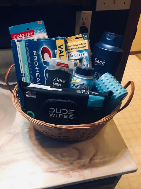 Gift Basket with Bathroom essentials #birthdaygift #giftbasketideas #birthdaybasket #bathroomessentials #toothbrush #toothpaste #dudewipes #backsrubber #dovedeoderant #dove #mensoneadays #birthdayhousetheme Bath Baskets Gift Ideas, Hygiene Basket, Bathroom Gift Basket, Baskets Gift Ideas, Dude Wipes, Bathroom Basket, Creative Gift Baskets, Gift Ide, Baskets For Men