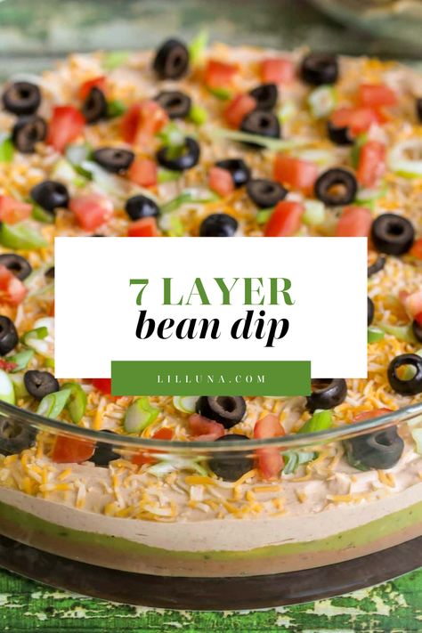 This 7 layer bean dip is a must-have at every function! It has loads of flavor and all your favorite dip ingredients! #7layerbeandip #7layerbeandiprecipe #beandip #7layerdip #tacodiprecipe 7 Layer Bean Dip Recipe, Frito Lay Bean Dip, Layered Bean Dip Recipe, Cream Cheese Bean Dip, Layer Bean Dip, 7 Layer Bean Dip, Bean Dip Recipe, Layered Dip Recipes, Layered Bean Dip