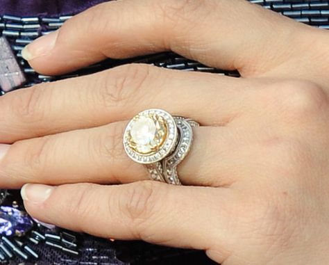 Carrie Underwood's ring from hubby Mike Fisher is a flawless yellow diamond by Johnathan Arndt Carrie Underwood Ring, Carrie Underwood Wedding Ring, Carrie Underwood Engagement Ring, Carrie Underwood Wedding, Celebrity Wedding Rings, Expensive Engagement Rings, Celebrity Rings, Mike Fisher, Stacked Rings