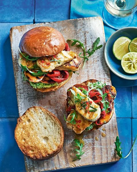 Slices of halloumi and sweet potato are marinated, grilled and placed in burger buns spread with a generous amount of smashed avocado. That's vegetari Sweet Potato Burgers, Smashed Avocado, Vegetarian Burger, Delicious Magazine, Mashed Avocado, Burger Buns, Avocado Recipes, Burger Recipes, Meat Free