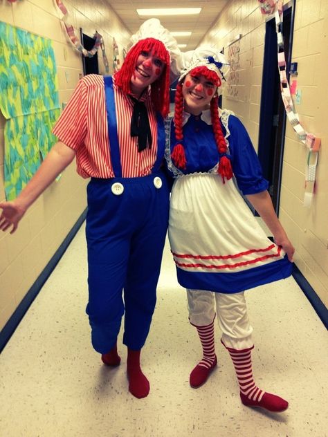 Raggedy Ann & Andy. Halloween 2012. I bought the Ann outfit a few years back and tweeked it a bit. The Andy costume I just pieced together from the Goodwill. The hair and bonnets are my fave part! Raggy Ann And Andy Costumes, Ragedy Ann Costume, Raggedy Ann Costume Women, Raggedy Ann And Andy Costume, Diy Raggedy Ann Costume, Raggedy Ann And Andy A Musical Adventure, Circus Costumes, Holiday 2022, Raggedy Ann And Andy