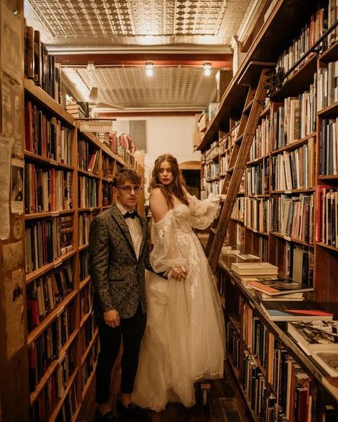 Elopement☽Wedding Photographer on Instagram: "The kind of love you only find in books… and this couple. More magic ✨ ⁣ Venue:⁣ @eltorreonkc Catering:⁣ @taylormadecateringkc ⁣Video: @austin.alan ⁣ #weddinday #vintagewedding #rainbow #rainbowbridephotos #rainbowweddingday #kcwedding #kansascitywedding #kcweddingphotographer #travelweddingphotographer #vintagebride #vintageweddingphotographer #eltorreon #bookstore #vintagebookstore #cottagecore" Engagement Photos In Bookstore, Old Library Wedding, Grocery Store Wedding Photos, Bookstore Wedding Photos, Bookstore Engagement Shoot, Engagement Photos Books, Wedding In A Library, Book Store Engagement Photos, Bookstore Proposal