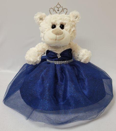 PRICES MAY VARY. 12" Quinceanera Teddy Bear with dress Can be given as a gift or used as a centerpiece 12 inches in height. Rhinestone tiara and an embroidered " Mis 15 Anos" For Collection and Decoration Purpose. For Age 14+. Due to different monitors/calibrations colors may vary slightly from the actual product. 12" is too small for you? No worry... Copy the below link will bring you to the 20" bears... https://www.amazon.com/dp/B09WRT81T9?ref=myi_title_dp&th=1 For those that are looking for s Quinceanera Last Doll, Quince Bears, Quinceanera Teddy Bear, Dress Centerpiece, Crème Color, Doll Teddy Bear, Curled Lashes, Quince Decorations, Rhinestone Tiara