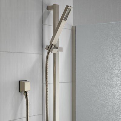 The Delta Vero Slide Bar Hand Shower delivers an invigorating shower experience in your bathroom. This hand shower has an adjustable spray with a full spray pattern. It is an excellent addition to modern bathroom decor. Made using a premium quality material, this hand shower stays strong and lasts for many years to come. It is available in a variety of finishes allowing you to choose the best one that suits your bathroom decor. This hand shower has an adjustable hose that provides excellent conv Delta Vero, Tub To Shower Remodel, Shower Remodel Diy, Small Shower Remodel, Fiberglass Shower, Tile Remodel, Small Showers, Shower Faucet Sets, Slide Bar