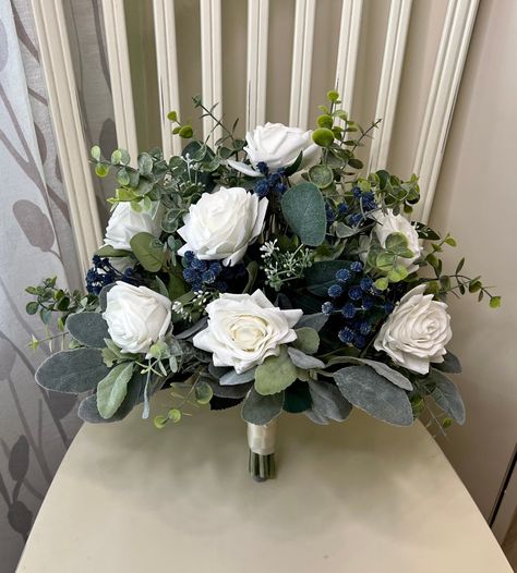 "Boho wedding bouquet premium white roses navy blue accent flowers & greenery bridal bouquet, wedding bouquet, silk sage bridesmaid flowers 🌿As Shown; Bridal 13-14\" (pictured) Bridesmaid 9-10\" Extra large bridal 15\" Cake flowers 8\" Hair comb 7\" 🌿The bouquet pictured may have already sold; so, I will be creating a re-make for you 🌿Please Note: No two items are identical.  Making a purchase in my shop means you acknowledge and agree with my shop's policies. Please take a look at the policies before ordering. For standard orders, please check the shipping information within each listing, our shop policies, or our shop announcement for current production times. If you are in a rush, please contact us. Thank you Jane" Greenery Bridal Bouquet, Navy Wedding Bouquet, 15 Cake, Winter Wedding Bouquet, Boho Wedding Bouquet, Silk Wedding Bouquets, Silk Bouquet, Sage Wedding, Rose Wedding Bouquet