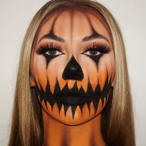 Pumpkin Faces Makeup Ideas, Pumpkin Face Makeup Men, Scary Pumpkin Halloween Makeup, Jack O Lantern Makeup Pretty, Scary Pumpkin Face Makeup, Pumpkin Face Paint Women, Black And Orange Halloween Makeup, Halloween Pumpkin Makeup Looks, Scary Woman Costumes