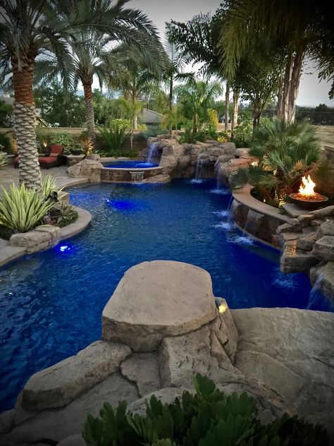 Rustic Pool Landscaping, Rock Feature Pool, Pool With Rocks Around It, Fire Pit And Pool Backyard, Rock Pool Ideas, Custom Pool Designs, Organic Pool Design, Rock Pools Backyard, Rustic Pool Ideas