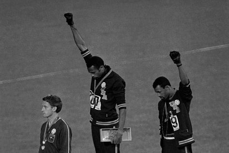 John Carlos and Tommie Smith were cast as villains after their protest on the medal stand. Black Power Salute, Medal Stand, Tommie Smith, 1968 Olympics, Black Power Movement, Dramatic Photos, Lee Evans, Black Panthers, Star Spangled Banner