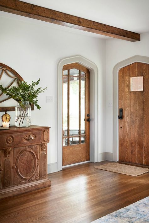 Beautiful entry! Come get inspired by Tranquil and Timeless Tudor Design Details From a Serene 1920s Texas Cottage renovated on HGTV's Fixer Upper by Chip and Joanna and known as the Scrivano House. #fixerupper #scrivano #cottagestyle #interiordesign #greytrim #serenedecor #entry #cottages Fixer Upper Decor, Traditional Bathroom Designs, Modern Tudor, Hgtv Fixer Upper, Tudor Home, Doors And Floors, Tudor Style Homes, Bathroom Design Inspiration, Tudor House