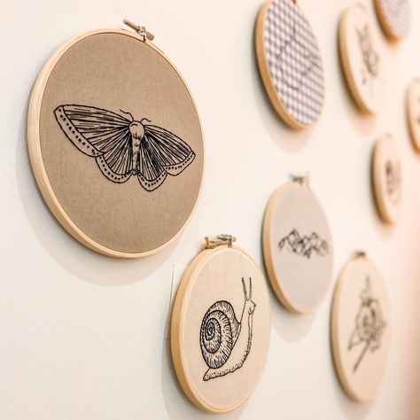 Our wall of embroidery hoops from artist @marystitches_ is one of our favorite spots in the shop! ���🙌 We love her pieces so much, I have two hoops hung in my daughter’s nursery 🙌 We are open 11-6 today! Miniature Embroidery, Embroidery Hoop Wall Art, Indie Art, Embroidery Hoop, Our Love, Art Shop, Love Her, Nursery, Miniatures