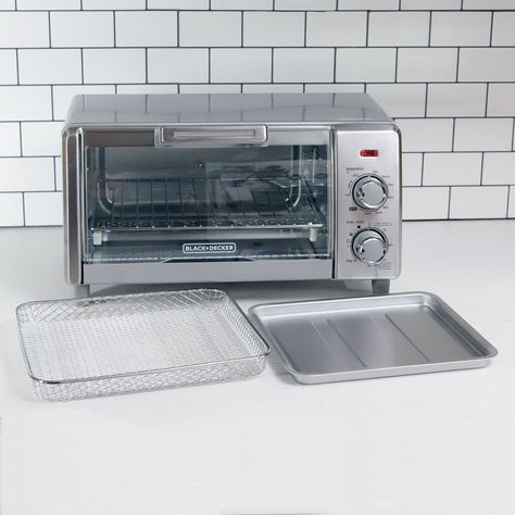 We reviewed the Black+Decker Crisp N' Bake Air Fry 4-Slice Toaster Oven, which earns space on the counter thanks to its surprisingly even toasting ability. Cooking French Fries, Crispy Food, Toaster Oven Recipes, Frozen Steak, Countertop Convection Oven, Home Necessities, Burnt Toast, Crispy Wings, Toast In The Oven