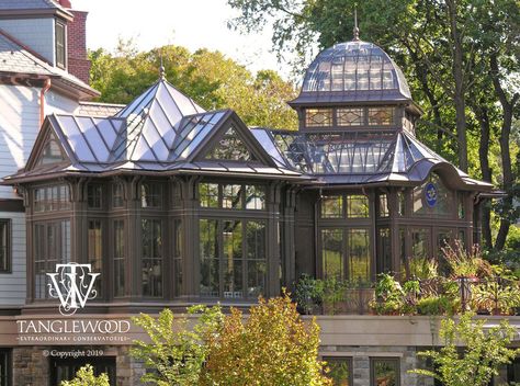 Perched high on a second-floor deck, this interconnected pair of horticultural houses supports the passion of its owner, an avid orchid enthusiast... ⁠ .⁠ .⁠ Click the link to learn more!⁠ .⁠ .⁠ .⁠ #customconservatories #conservatories #greenhouses #customgreenhouses #orchidhouse #growinggreenhouse #glasshouse #luxuryhomeadditions #art #architecture #artandarchitecture #cupola #traditionalarchitecture #steelconservatory #steelandglass #horticulture #palmhouse #homerenovation #customhomes Victorian Conservatory Interior, Classic Window Design, Traditional Sunroom, Solarium Ideas, Glass Green House, Conservatory Sunroom, Victorian Conservatory, Waterfront House, Conservatory Ideas