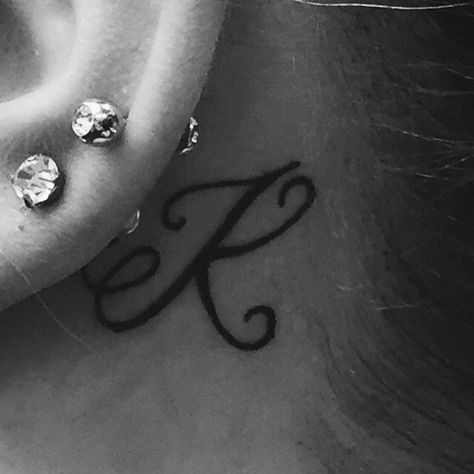 K Behind Ear Tattoo, Initial Tattoo Behind Ear, Letter K Tattoo, Initial Tattoos, Unique Tattoos Black Women, Tattoo Behind Ear, K Tattoo, Tattoos For Black Skin, Initial Tattoo