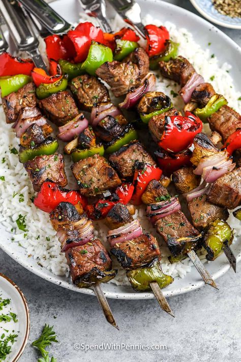 For classic Texas roadhouse flavor, this recipe for steak kabob marinade turns out perfectly. For easy shish kabobs with peppers, mushrooms, and onions, grilled to tender and juicy perfection, look no further than this easy steak kabob recipe. The whole family is sure to enjoy these steak bites! #steakkabobmarinade #besteasymarinadeforsteak #grilledsteakkabobsmarinade #spendwithpennies Steak Kabob Marinade, Kabob Marinade Recipes, Potato Kabobs, Beef Kabob Marinade, Grilled Steak Kabobs, Best Grilled Steak, Kabob Marinade, Classic Savory, Steak Kabobs