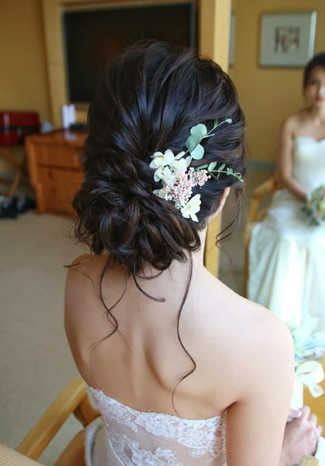 Hairstyles Low Bun Wedding, Bridal Updo Brunette Low Buns, Bridesmaid Updo With Flowers, Low Bun Accessories, Quince Bun Hairstyles With Flowers, Side Bun With Flowers, Low Bun Hairstyles With Flowers, Low Bun Prom Hairstyles Brown Hair, Low Messy Bun With Flowers