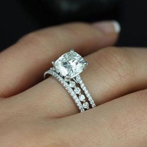 We are loving the mix and match stackable band trend! Check out this subtle shared prong band setting off the gorgeous cushion center stone and marching band. Like? ❤️ #padisbride #engagementring #bling #weddingband #weddingbands #diamonds #whitegold #jewels #engaged #wedding #jewelry #platinum #sfbride #shoplocal #round #sopretty #jewelrygram #jewelryaddict #loveislove #sparkle #theknot #ido Bling Rings, Dream Ring, St Michael, Bridal Sets, Morganite, Moissanite Engagement, Bling Bling, Ring Verlobung, Perfect Wedding