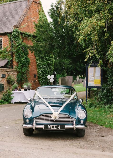 Classic blue wedding car with white ribbon decorations tied at the front Vintage Cars Wedding, Wedding Car Ribbon, Cars Wedding, Vintage Wedding Car, Classic Blue Wedding, Diy Rustic Wedding, Wedding Transport, Vintage Car Wedding, Wedding Car Decorations