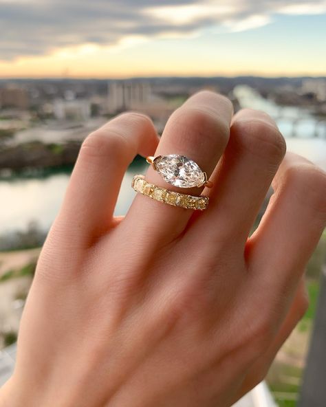 💥NEW💥 Ring alert🚨 Not your grandma’s bezel — we re calling it a “half bezel” even though it’s much less than half. The belly of your diamond is completely exposed in this ring so that you can see it from *ALL* angles... not just the top. Cheers to all you minimalists out there 🥂 (we paired it with a Fancy Yellow Radiant cur eternity band - can you dig it?!)