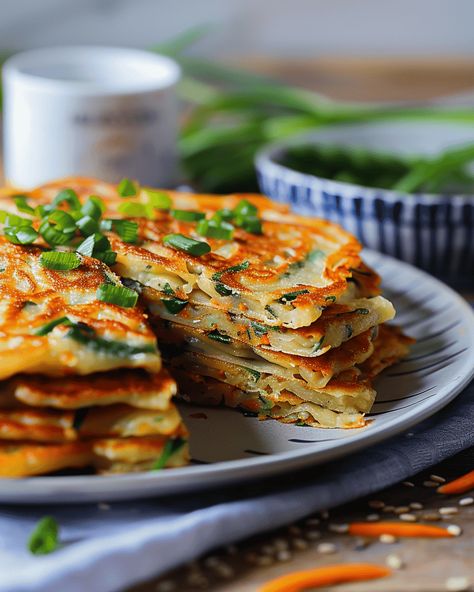 Korean Pancakes (Pajeon) – A Flavorful and Easy Snack If you’re looking for a savory, veggie-packed dish that’s quick to prepare and full of flavor, Korean Pancakes (Pajeon) are the ... Read more Thai Pancakes, Savory Pancakes Recipe, Pajeon Recipe, Korean Potato Pancake, Chinese Pancakes, Savoury Pancake Recipe, Chinese Pancake, Curry Soup Recipes, Crispy Pancakes