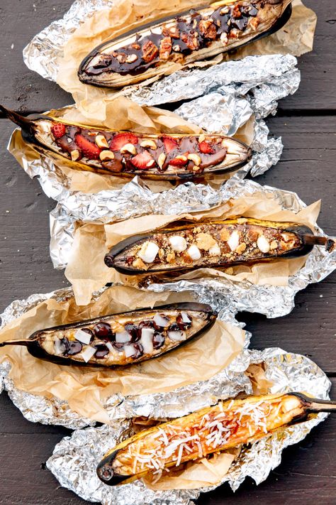 Campfire Banana Boats 9 Ways Campfire Banana Boats, Campfire Bananas, Camping Meals For Kids, Camping Meal Planning, Camping Food List, Banana Boats, Healthy Camping Food, Grilled Bananas, Campfire Desserts