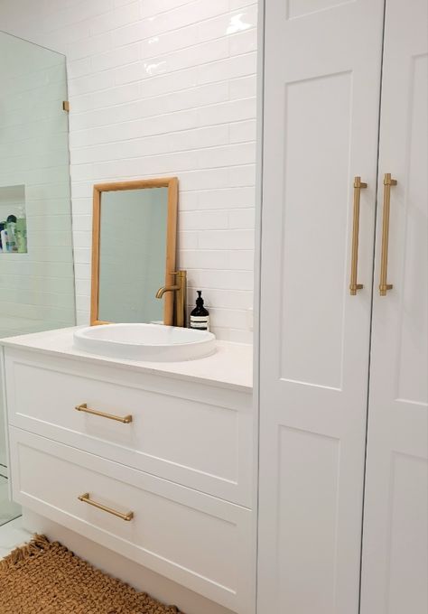 love our Shaker Lucca with the brass handles and tapware sitting alongside our shaker linen tower with White Truffle stone top and an oval inset basin
#classiquekitchens_vanities #bathroom #whitebathroom #shakerbathroom #hamptonstyle #hamptonsbathroom #shakercabinets #qldhomes #brisbanebathrooms Vanity Linen Tower, Shaker Linen Cabinet, Small Bathroom With Linen Cabinet, Single Sink Bathroom Vanity With Tall Side Cabinet, Bathroom Vanities With Storage Towers, Single Sink Vanity With Storage Tower, Vanity With Tall Side Cabinet, Bathroom Vanity With Tall Side Cabinet, Bathroom Shaker Cabinets