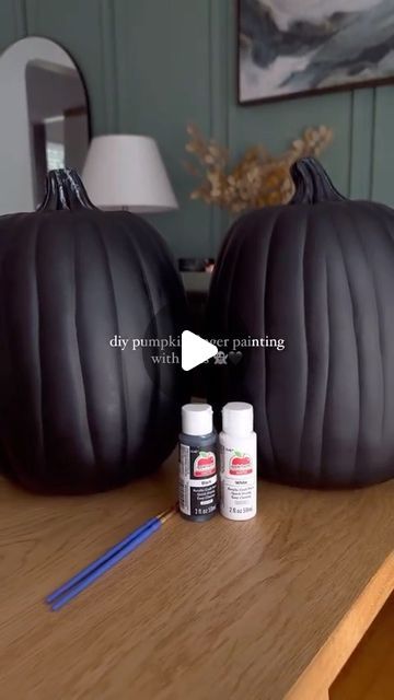 Victoria McFall on Instagram: "The perfect little craft to do with your kids for Halloween!! 👻 to do your own pumpkin finger painting - comment GHOST and I’ll send you the links to everything I used! 🖤 I’ll be putting these out every year with my spoooky decor! ✔️  Pumpkin painting, halloween diy, pumpkin ideas, halloween crafts, spooky season, spooky szn, kid crafts, crafty mom, walmart finds" Painting Ghosts On Pumpkins, Black Pumpkin Decorating Ideas, Black Pumpkin Ideas, Black Pumpkin Painting Ideas, Pumpkin Ideas Halloween, Ghost Pumpkin Painting, Spooky Pumpkin Painting Ideas, Halloween Diy Pumpkin, Pumpkin Painting Halloween