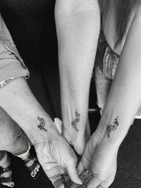 3 generations matching tattoo : daughter, mom, and grandmother Matching Tattoos For Mom Daughter And Grandma, Grandma Mother Daughter Tattoos, Grandma Mom And Daughter Tattoo, Generational Tattoos, Matching Grandma Granddaughter Tattoos, Generations Tattoo, Grandma And Grandpa Tattoos, 3 Generation Tattoo Ideas, Grandma And Granddaughter Tattoos