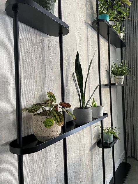 This unique shelving unit, held up by 5 steel pillars, comes with 7 floating shelves. Move them up or down, or reorganize the whole layout and place the shelves any way you prefer. Unit can be installed straight along a wall, as a room divider or set inside or outside of a corner. Additional pillars and shelves are available, so this unit can be made to fit along any wall you choose. Even turn it and have the unit go around a corner or curve. Standard Pillars fit 9' ceiling. Additional options a Luxury Shelves, Floor To Ceiling Shelving, Master Bath Decor Ideas, Recessed Wall Shelves, Corner Shelf Decor, Unique Shelving, Laneway House, Room Divider Shelves, Ceiling Shelves