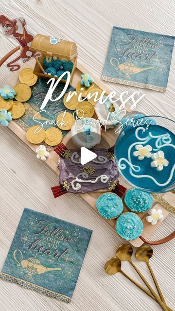 Melany Afara | Tiny Trends by MA on Instagram: "Princess Snack Board Series Part 6 - This is Jasmine.  . I created a dessert 🧁 board. The inspo came from the little treasure chest I found at the Dollar store. It represents the cave filled with gold where Aladdin finds the magic lamp. Quick tip: I used the quick set method for the jello but I would recommend just making it the regular way. I’d do that next time as I don’t feel like it set properly.  . Can you spot all the Aladdin symbolism in this? Make sure to share with your Disney loving friends.  . . #princesssnackboard #princessdiy #disneyprincess #snackboardseries #birthdaysnacks  . . Disney snacks, Disney food, foodies, birthday party inspo, Aladdin and Jasmine, princess treats" Princess Treats, Princess Snacks, Snack Boards, Jasmine Princess, Birthday Snacks, Magic Lamp, Princess Diy, Disney Snacks, Snack Board