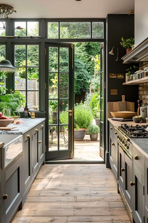 Greenhouse Inspired Kitchen, Atrium Kitchen Extension, Kitchen With Doors To Outside, Atrium Addition, Inside Outside Kitchen, Conservatory Kitchen Extension, Greenhouse Dining Room, Orangery Extension Kitchen, Courtyard Kitchen