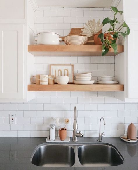 7 Ways You Can Make Your Home Feel Brand-New For Less Than $20 Shelves Above Kitchen Sink, Shelves Above Sink, Above Kitchen Sink, Decorating Above Kitchen Cabinets, Kitchen Floating Shelves, Above Sink, Orange Home, Floating Shelves Kitchen, Shelves Kitchen