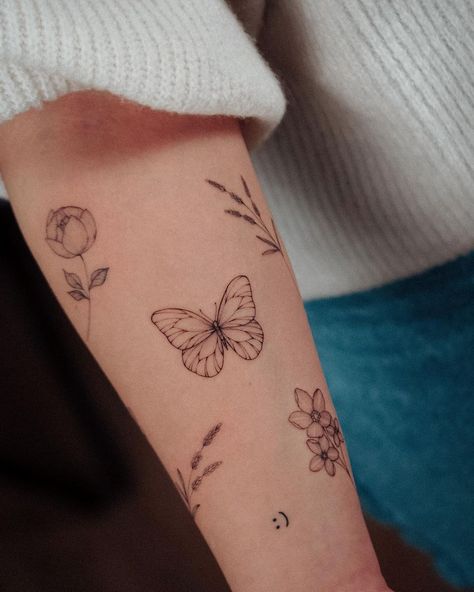 Can’t get enough of this bracelet…🦋 . . . #bunamiink #floralillustration #armtattoo #wildflowertattoo #butterflytattoo #butterfly… | Instagram Bunami Ink, Butterfly Tattoos Images, Butterfly Tattoos On Arm, Butterfly Wrist Tattoo, Traditional Tattoo Flowers, Lavender Tattoo, Vegan Tattoo, Wildflower Tattoo, Forearm Sleeve