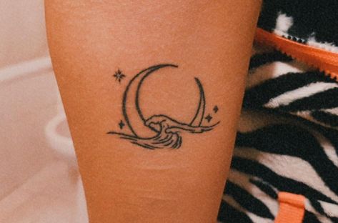 340+ Beach Tattoo Designs (2023) - TattoosBoyGirl Moon And Sea Tattoo Minimalist, Star And Sea Tattoo, Moon And Beach Tattoo, Sea And Stars Tattoo, Moon Beach Tattoo, Sea And Moon Tattoo, Ocean And Moon Tattoo, Star Of The Sea Tattoo, Sea Minimalist Tattoo